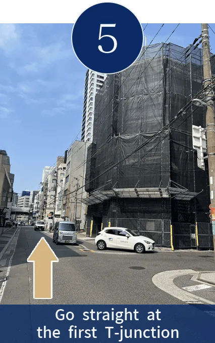 Go straight at the first T-junction